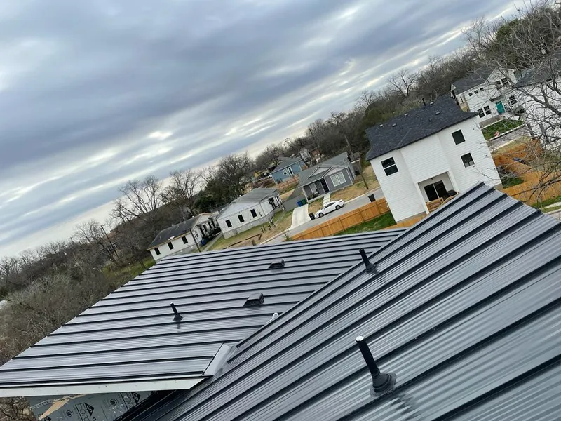 Standing seam metal roof panels with vents for Skylight Repair in Forest Park